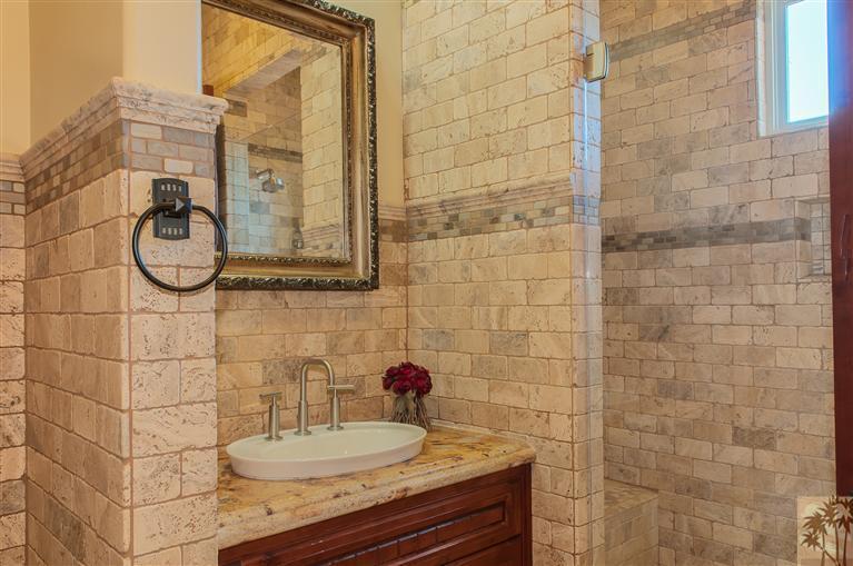 70551 Sunny Lane Rancho Mirage, CA 92270 - Photo 25 of 35 a bathroom with a sink and a mirror