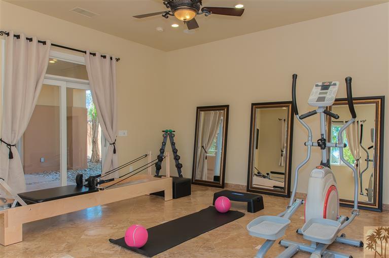 70551 Sunny Lane Rancho Mirage, CA 92270 - Photo 28 of 35 a view of a room with gym equipment