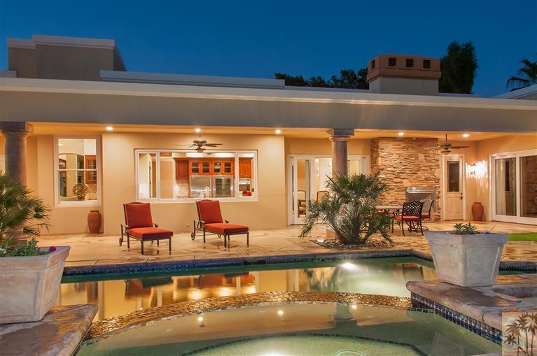 70551 Sunny Lane Rancho Mirage, CA 92270 - Photo 32 of 35 a view of a living room and kitchen