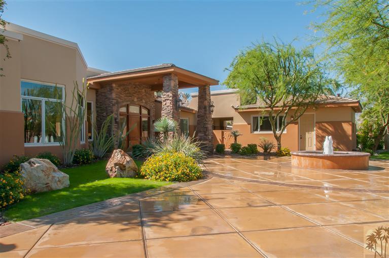 70551 Sunny Lane Rancho Mirage, CA 92270 - Photo 34 of 35 a front view of a house with garden