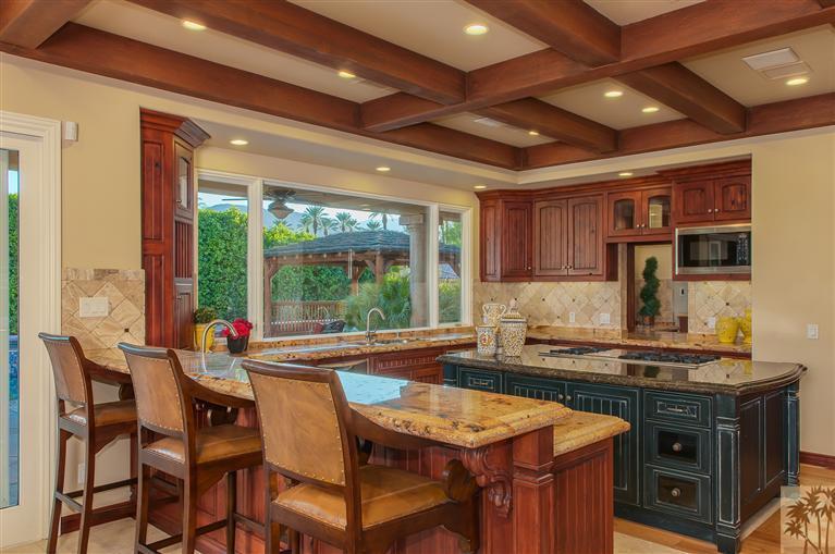 70551 Sunny Lane Rancho Mirage, CA 92270 - Photo 7 of 35 a kitchen with a stove and a refrigerator