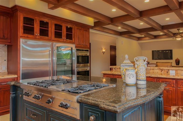 70551 Sunny Lane Rancho Mirage, CA 92270 - Photo 10 of 35 a kitchen with a stove and a granite counter top