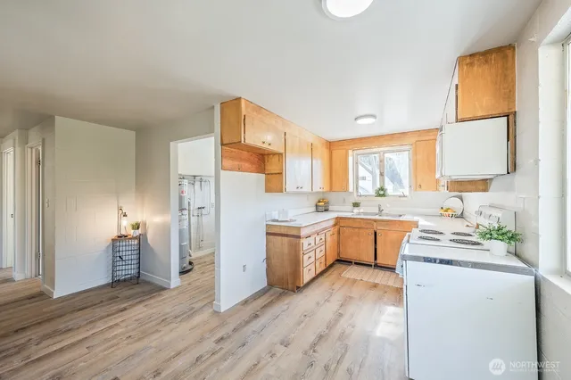 a view of a living room and a wooden floor