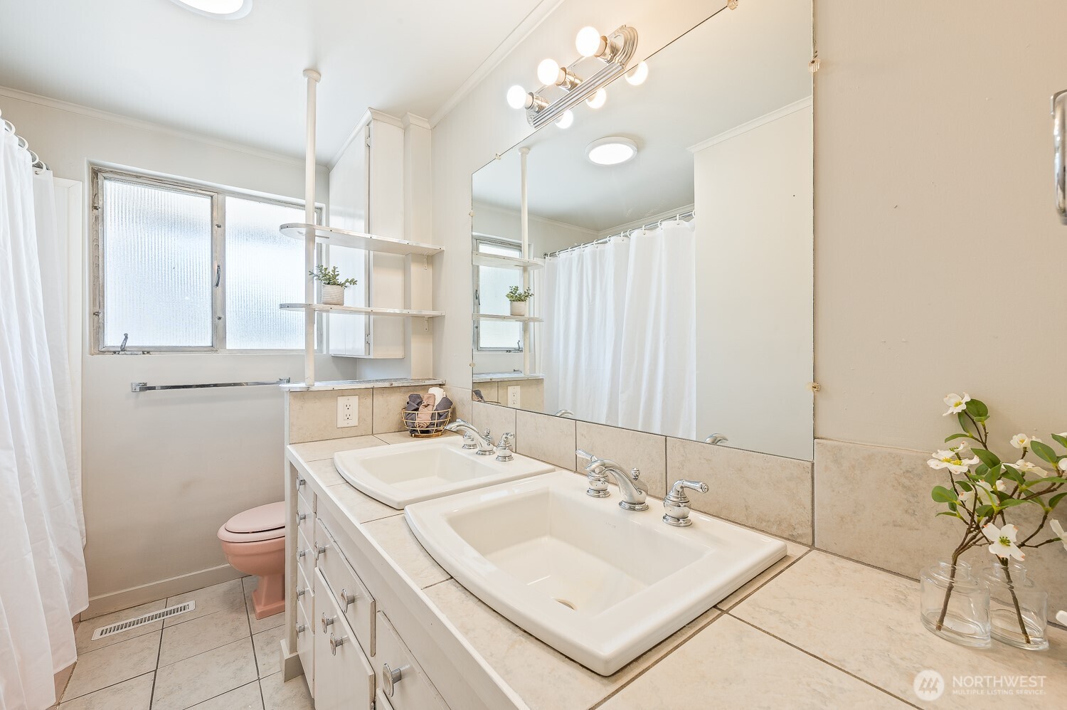 18451 Camp 12 Road Leavenworth, WA 98826 - Photo 19 of 20 a bathroom with a sink a toilet and mirror