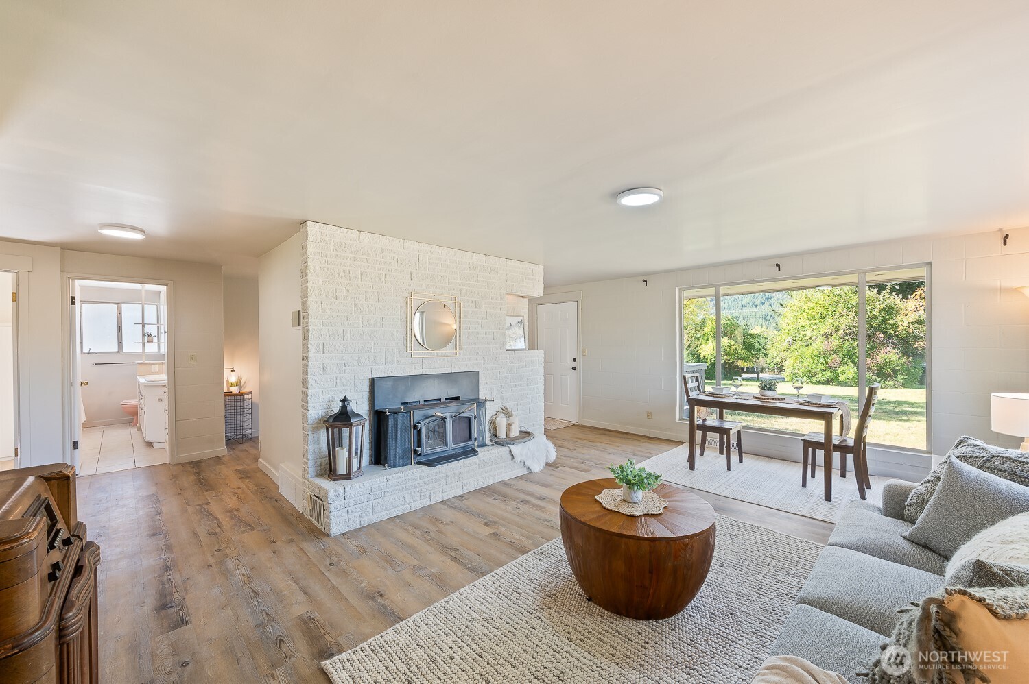 18451 Camp 12 Road Leavenworth, WA 98826 - Photo 8 of 20 a living room with furniture and a large window