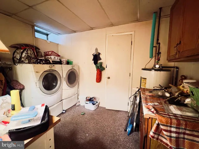a view of a room with washer and dryer