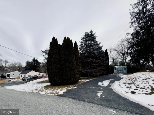 a view of a road with a snow on the road
