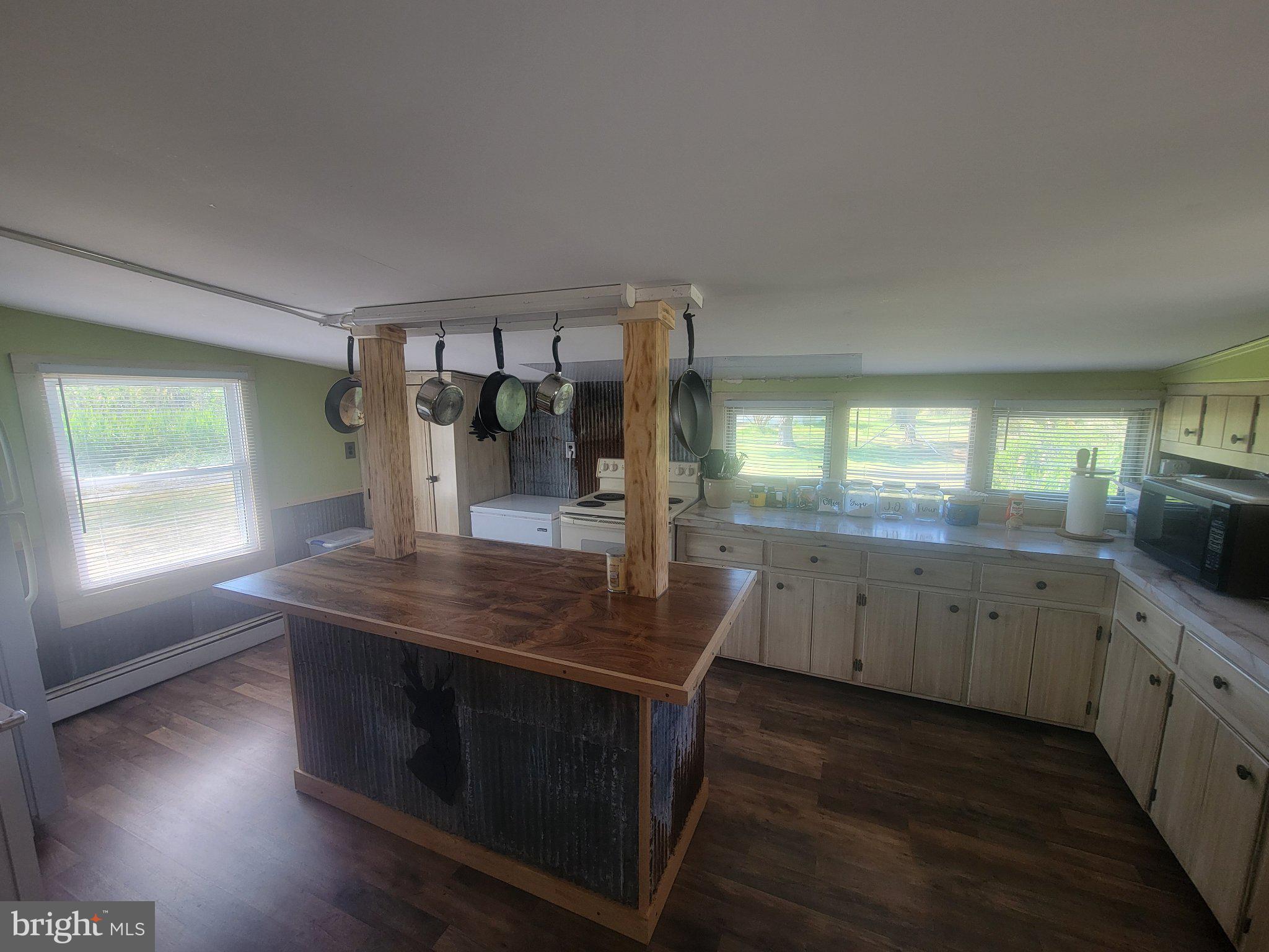 2106 Wingate Bishops Head Road Wingate, MD 21675 - Photo 11 of 37 Charming kitchen with rustic flair.