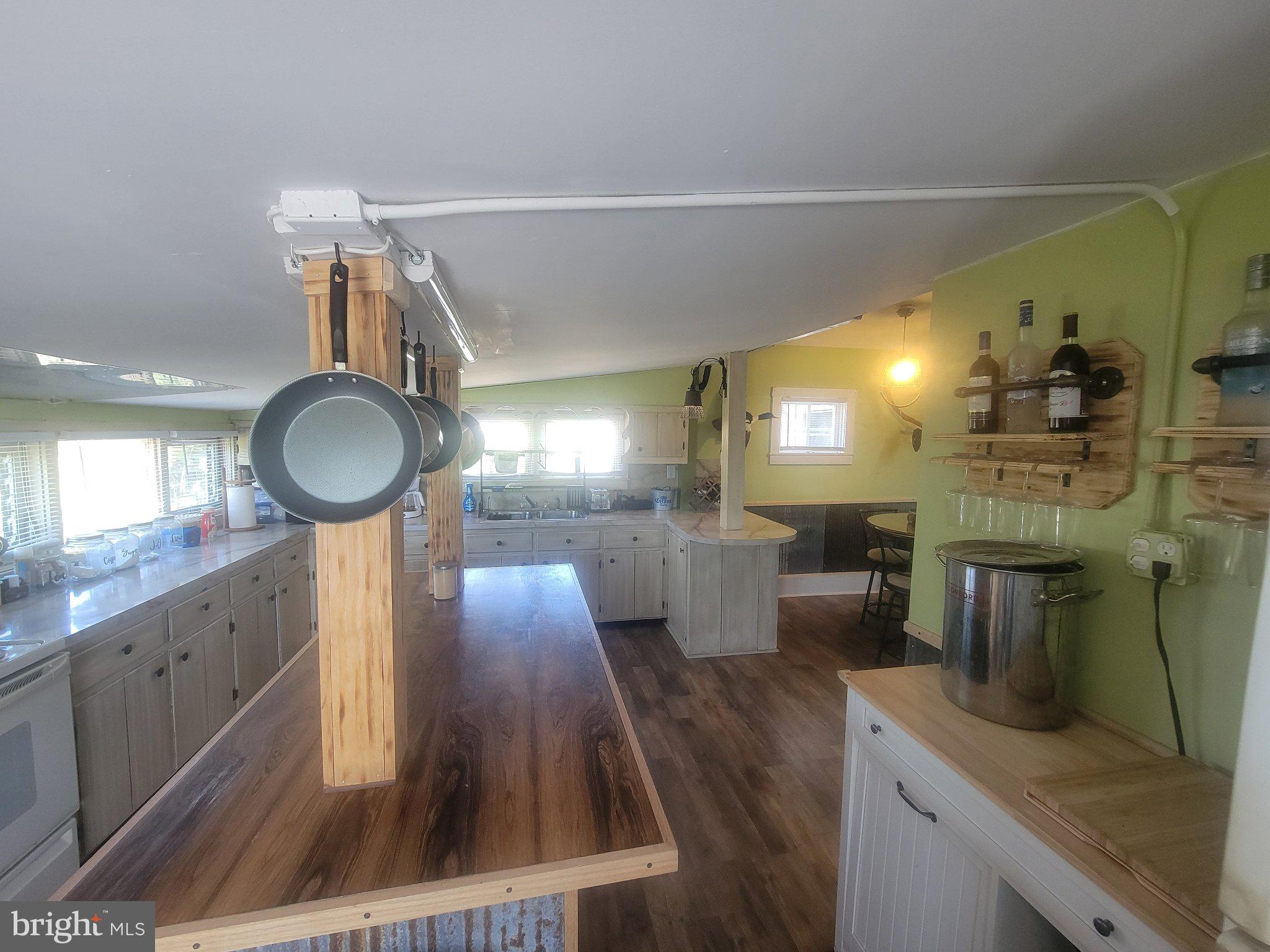 2106 Wingate Bishops Head Road Wingate, MD 21675 - Photo 12 of 37 Charming kitchen with rustic flair.