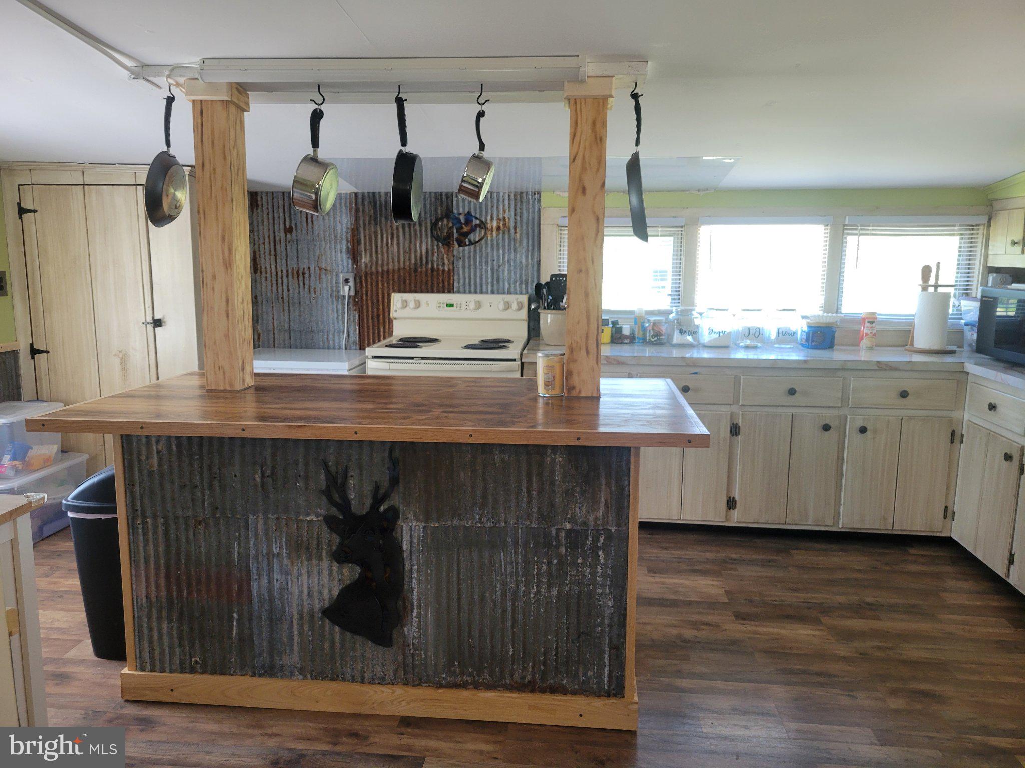2106 Wingate Bishops Head Road Wingate, MD 21675 - Photo 17 of 37 Rustic kitchen with modern charm.