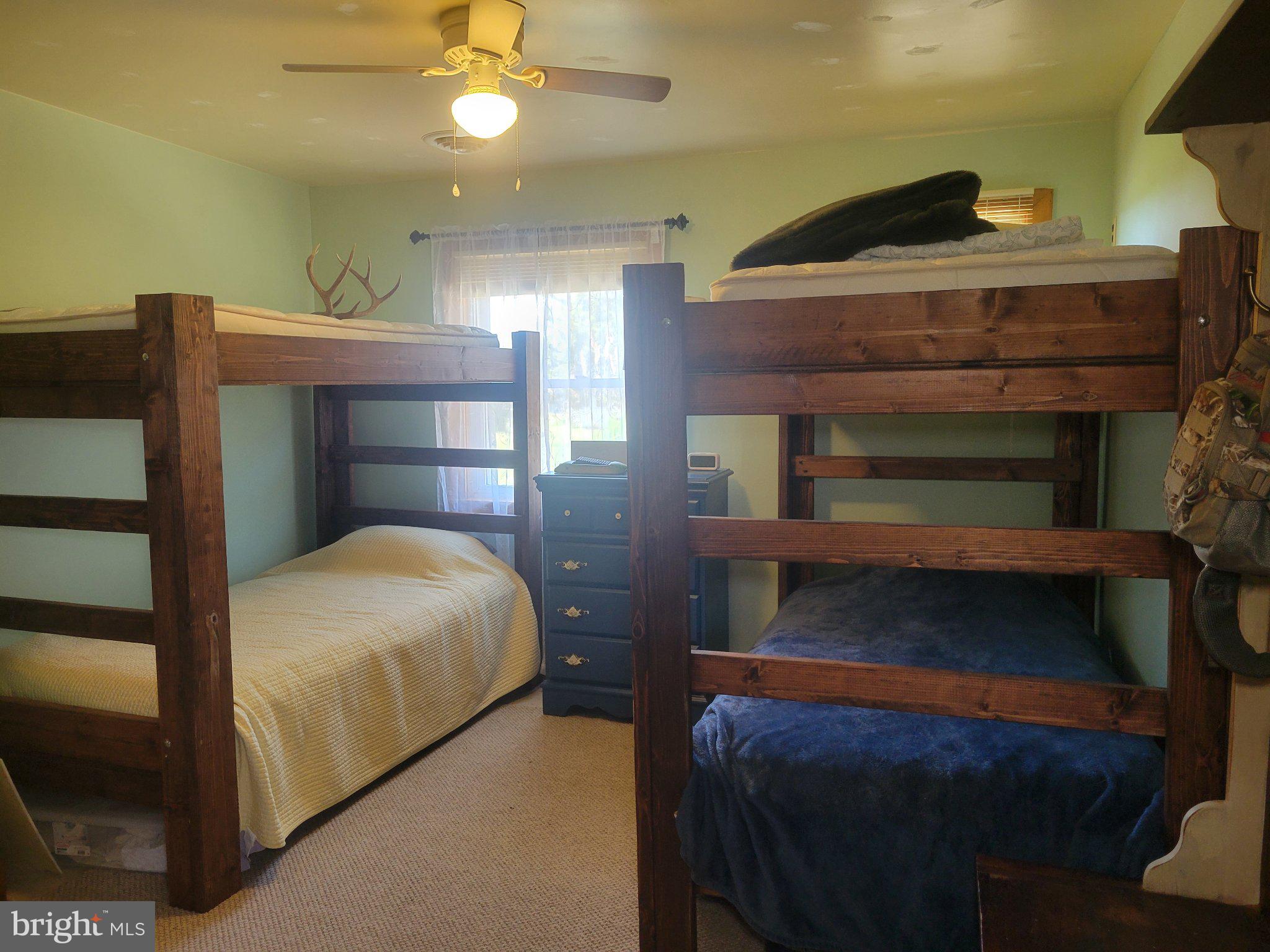 2106 Wingate Bishops Head Road Wingate, MD 21675 - Photo 25 of 37 Cozy bunk room for restful nights.