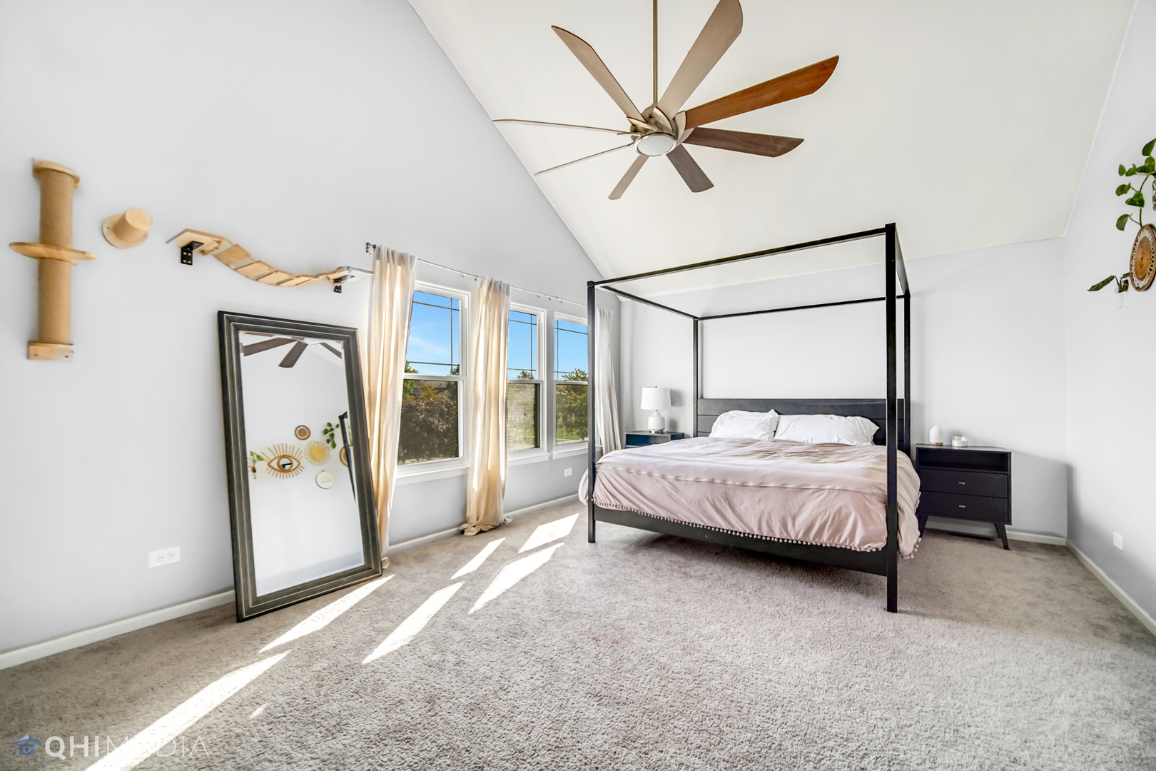 7930 Farmhouse Road Frankfort, IL 60423 - Photo 16 of 24 a spacious bedroom with a large bed and a chandelier