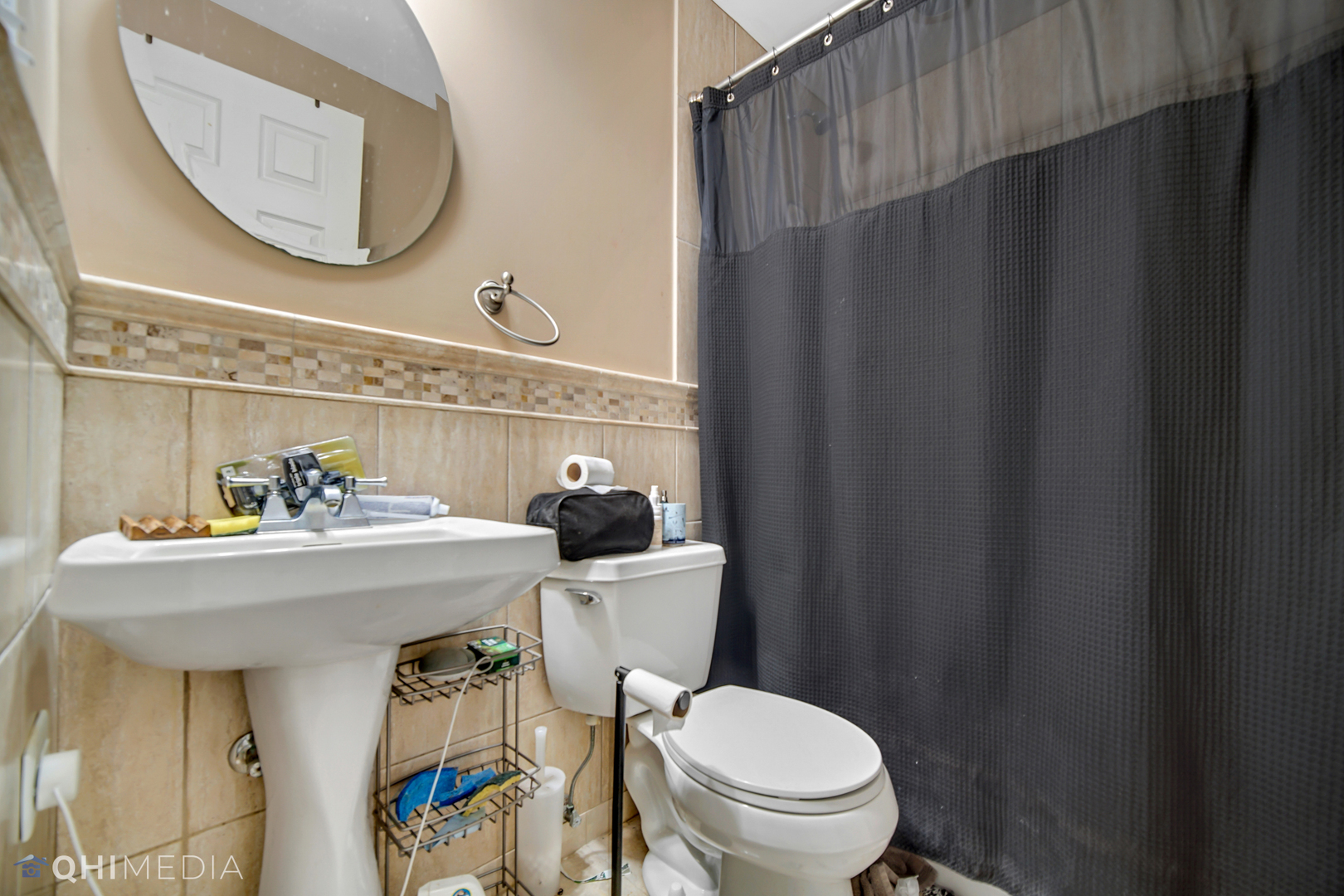 7930 Farmhouse Road Frankfort, IL 60423 - Photo 19 of 24 a bathroom with a sink a toilet and a mirror