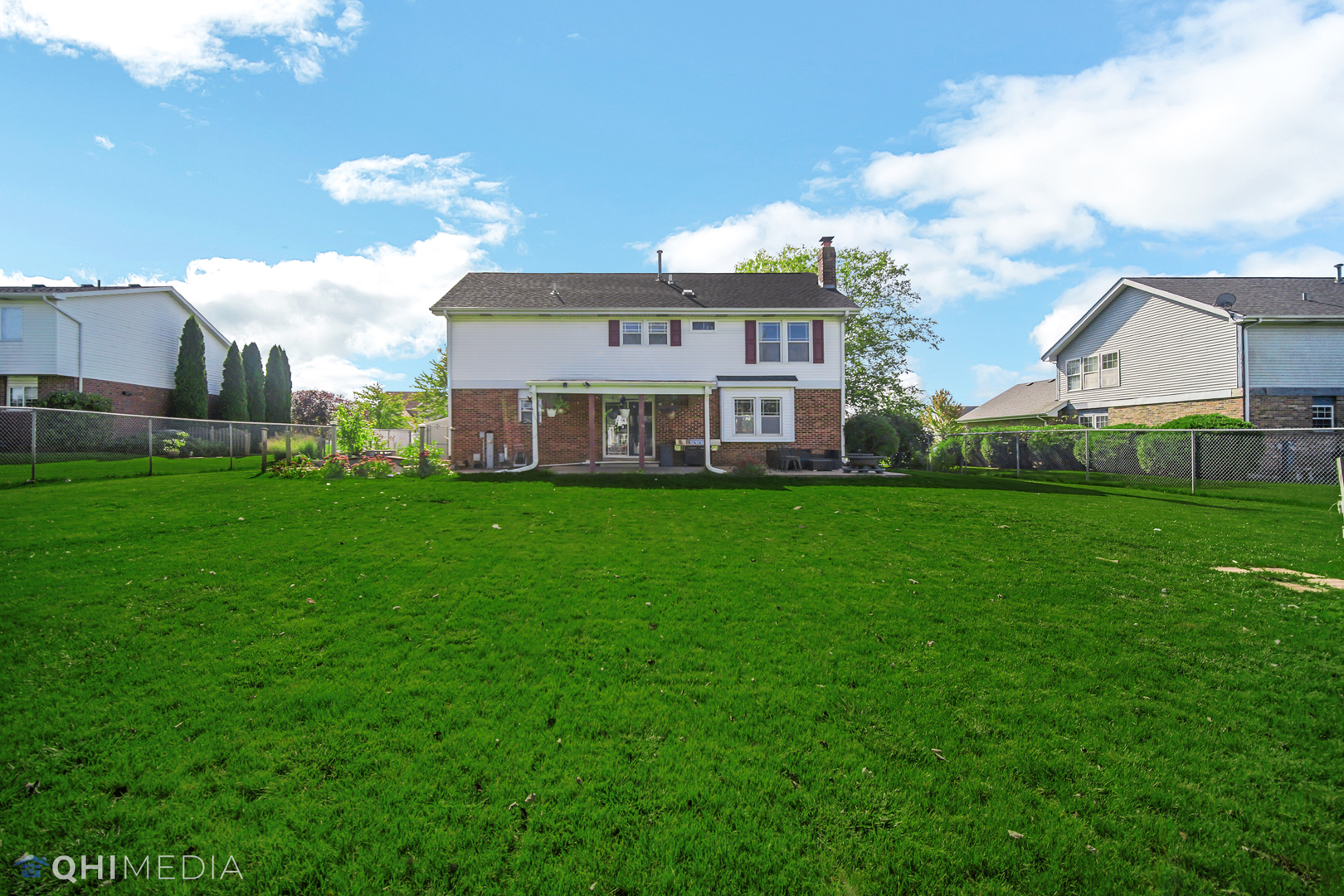 7930 Farmhouse Road Frankfort, IL 60423 - Photo 23 of 24 a view of a house with a big yard and large trees