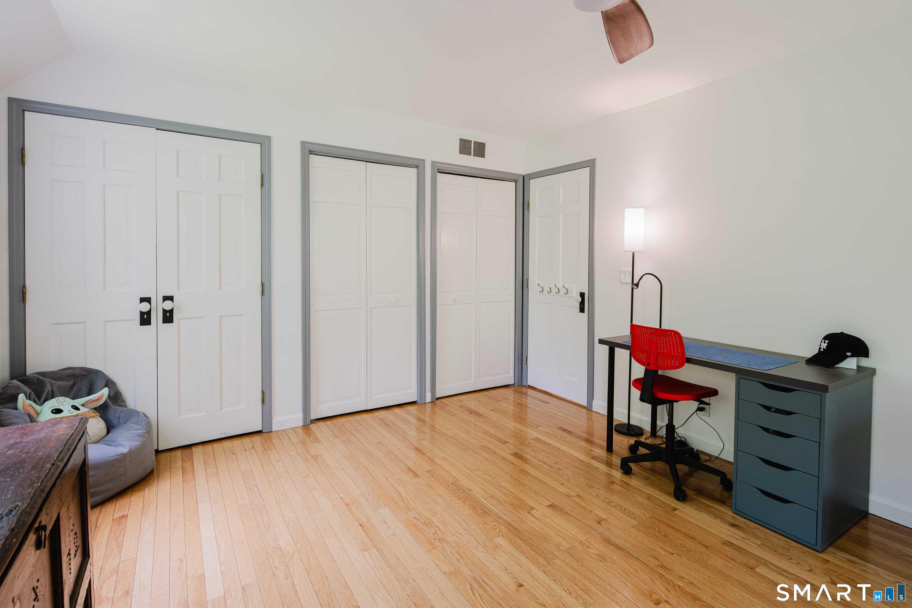 3 Partridge Trail Sherman, CT 06784 - Photo 31 of 37 a room that has a bed and a chair in it
