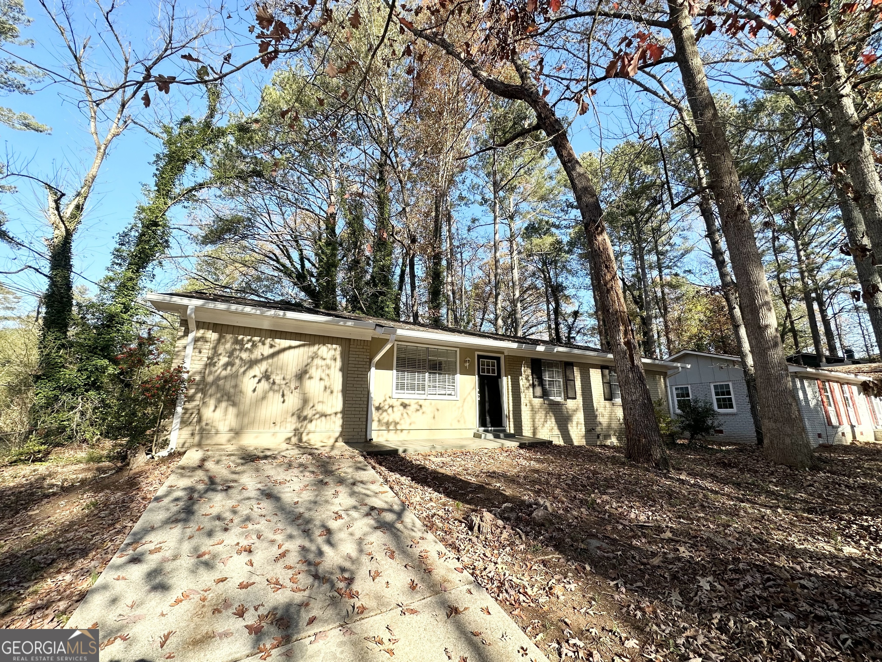 4448 Malibu Drive Decatur, GA 30035 - Photo 2 of 7 a view of backyard with large trees