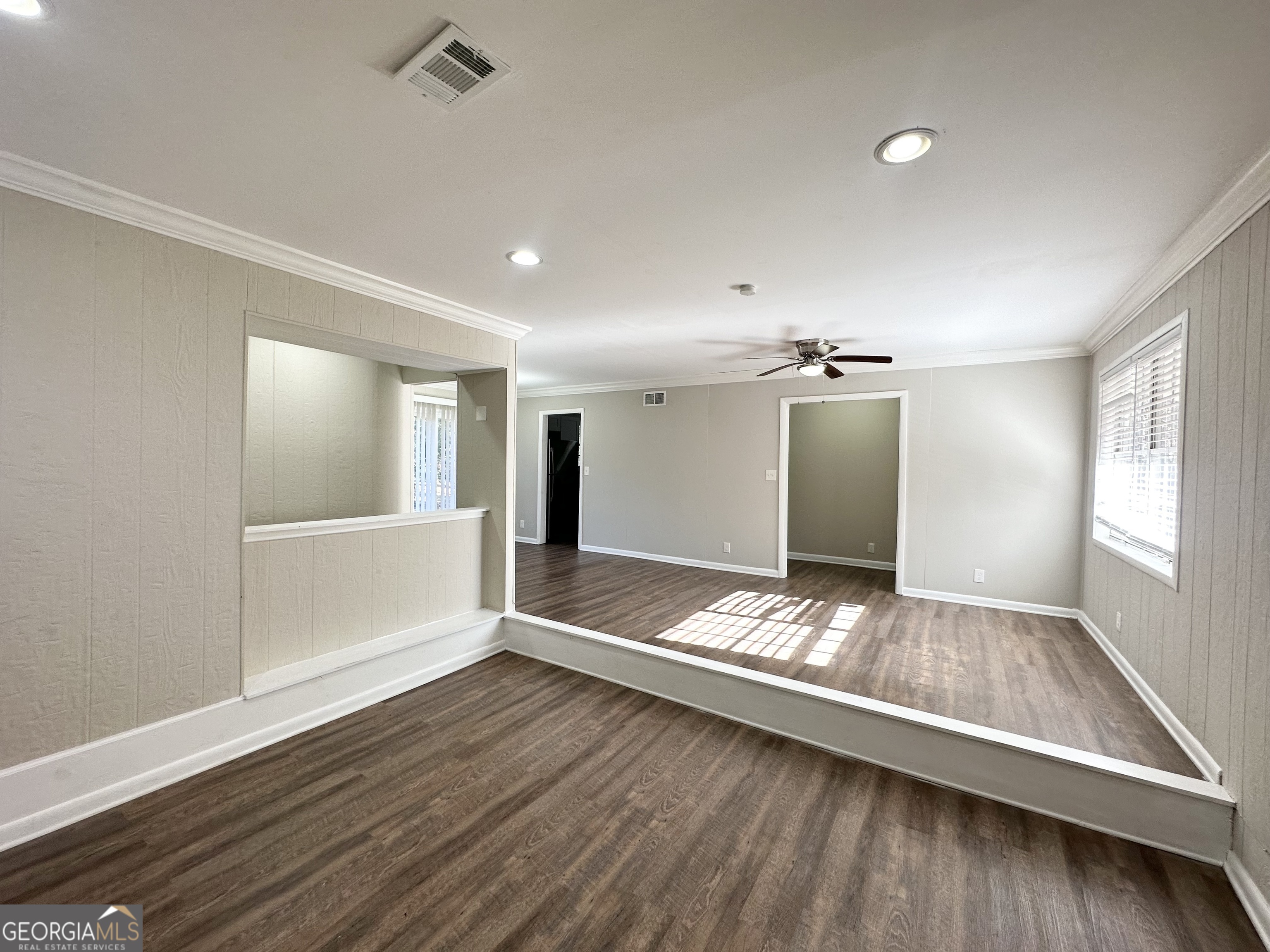 4448 Malibu Drive Decatur, GA 30035 - Photo 3 of 7 a view of room with window and wooden floor
