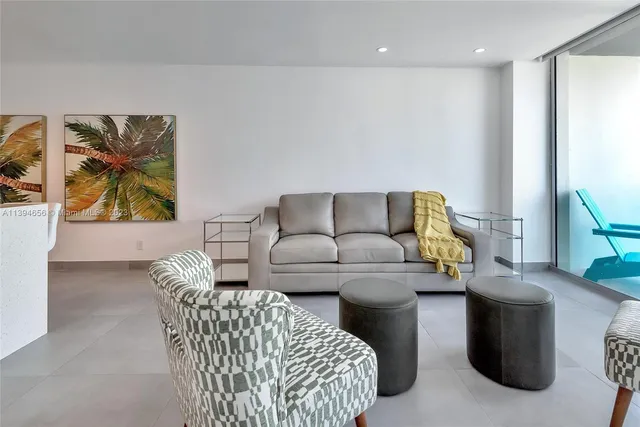 a living room with furniture and a couch