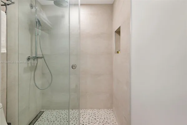 a swimming pool with outdoor seating and yard