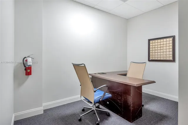 a kitchen with a sink and a vanity