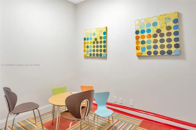 a view of a livingroom with furniture