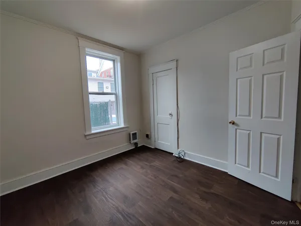 a view of small space with wooden floor