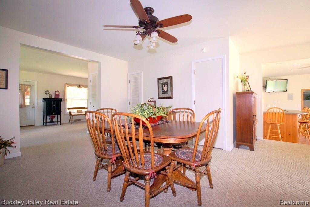 9385 Spencer Road South Lyon, MI 48178 - Photo 4 of 28 Carpeted Formal Dining Room