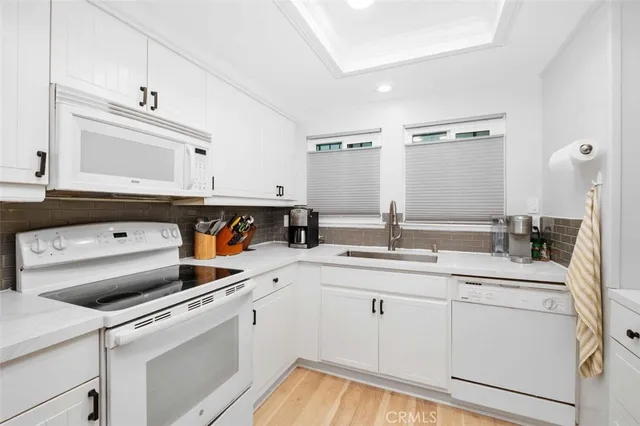 a view of living room with furniture and window