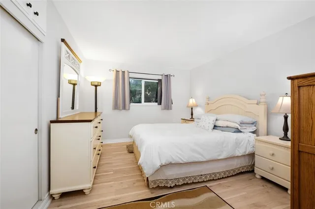 a utility room with cabinets dryer and washer