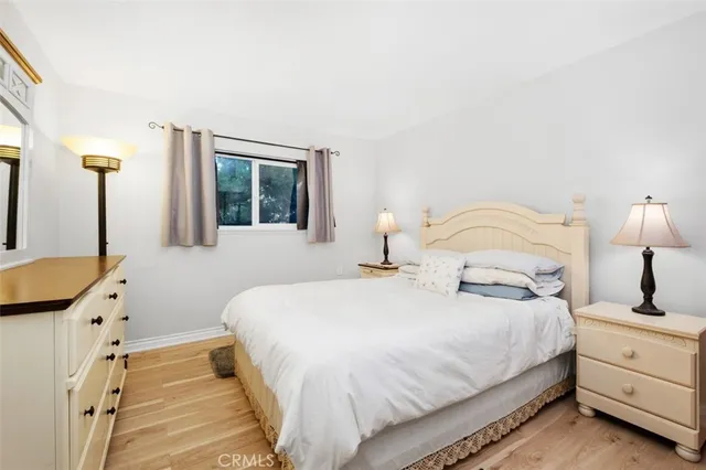 a kitchen with a sink cabinets and a window