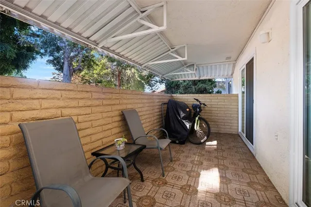 a car parked in front of white house