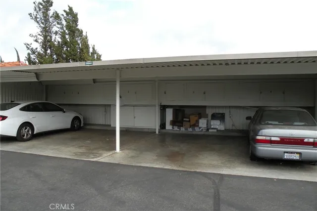 a view of two blue and white house