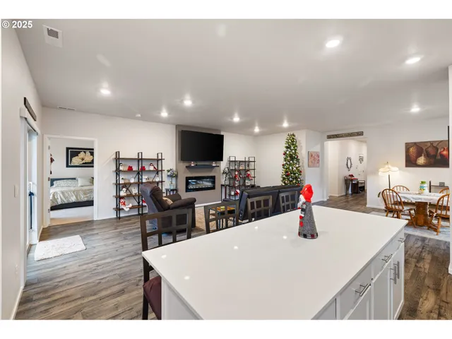 a kitchen with a dining table and chairs