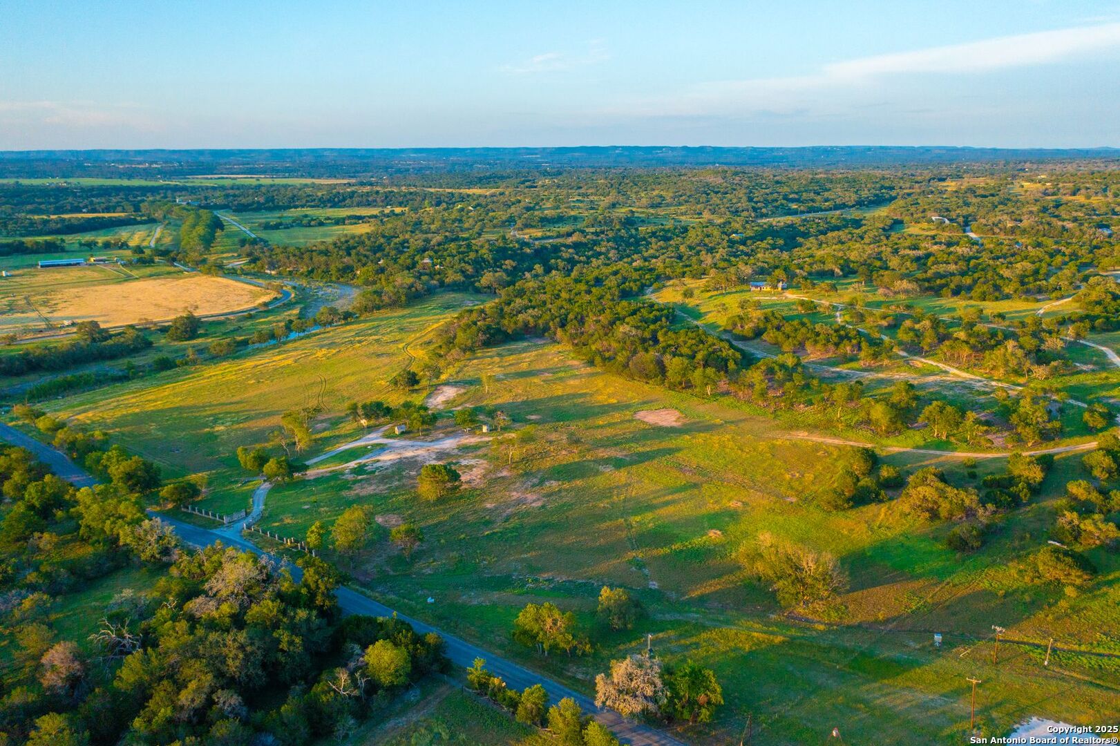 327 Waring Welfare Road Boerne, TX 78006 - Photo 2 of 17 a view of an ocean and a yard