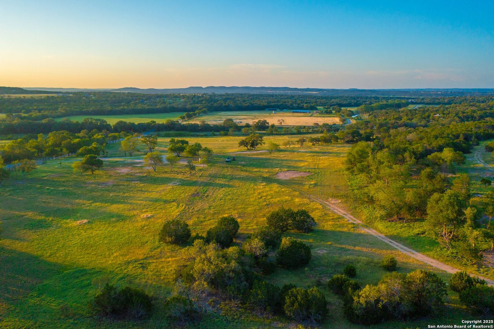 327 Waring Welfare Road Boerne, TX 78006 - Photo 3 of 17 a view of an ocean and a mountain