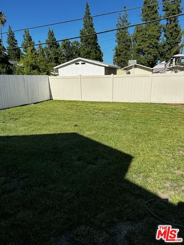 a view of an outdoor space and a yard