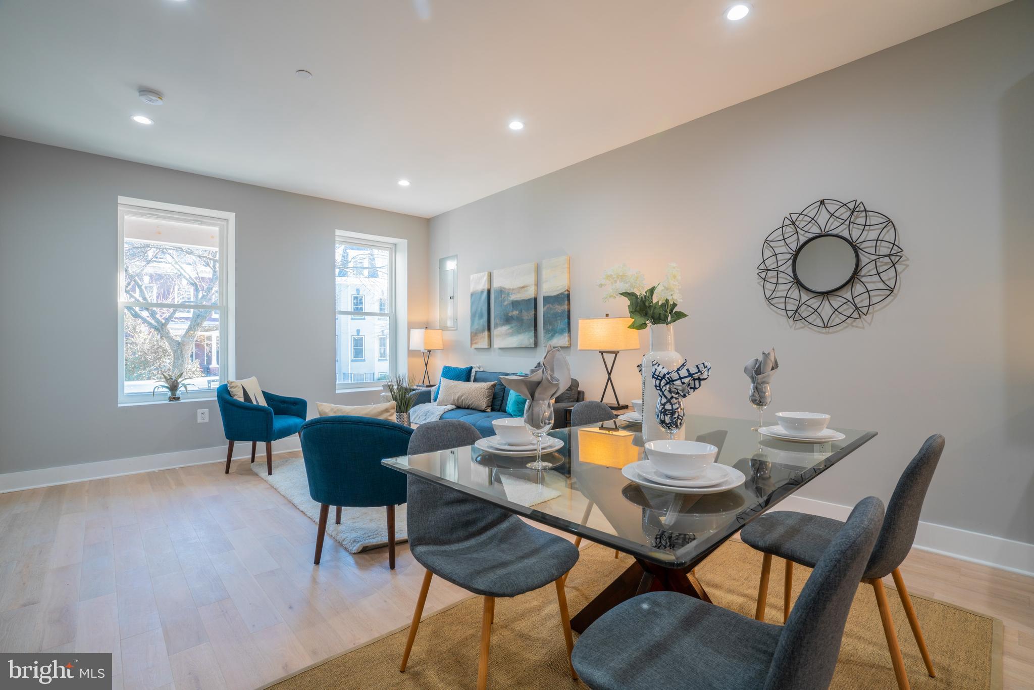 1225 Park Road Northwest, Unit 1 Washington, DC 20010 - Photo 11 of 38 a view of a dining room with furniture window and wooden floor