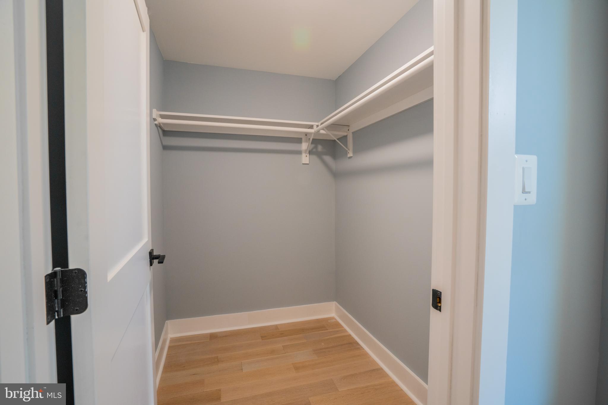 1225 Park Road Northwest, Unit 1 Washington, DC 20010 - Photo 20 of 38 a view of a room with rack on the wall