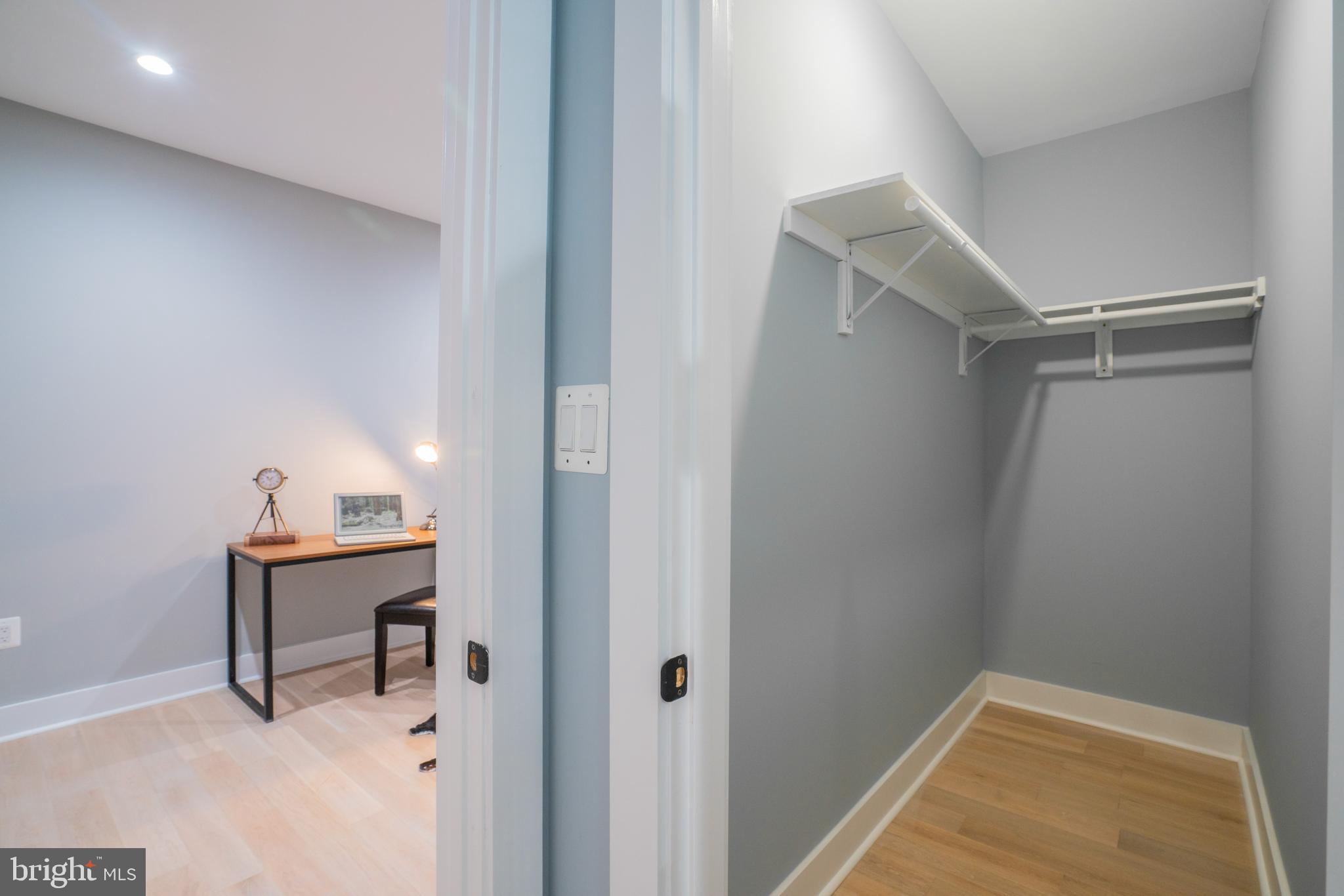 1225 Park Road Northwest, Unit 1 Washington, DC 20010 - Photo 24 of 38 a room with a table and wooden floor