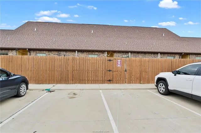 an outdoor view with parking space