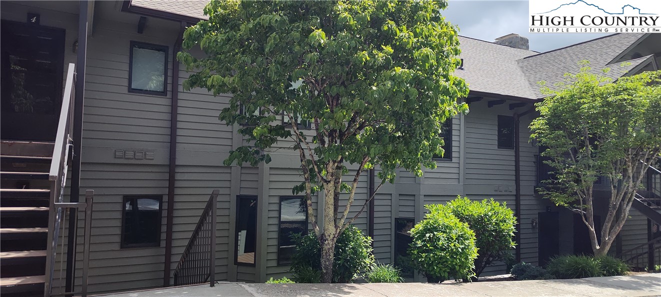 140 Manor View Lane, Unit CASCADES 2 Blowing Rock, NC 28605 - Photo 2 of 25 a view of a house with a tree