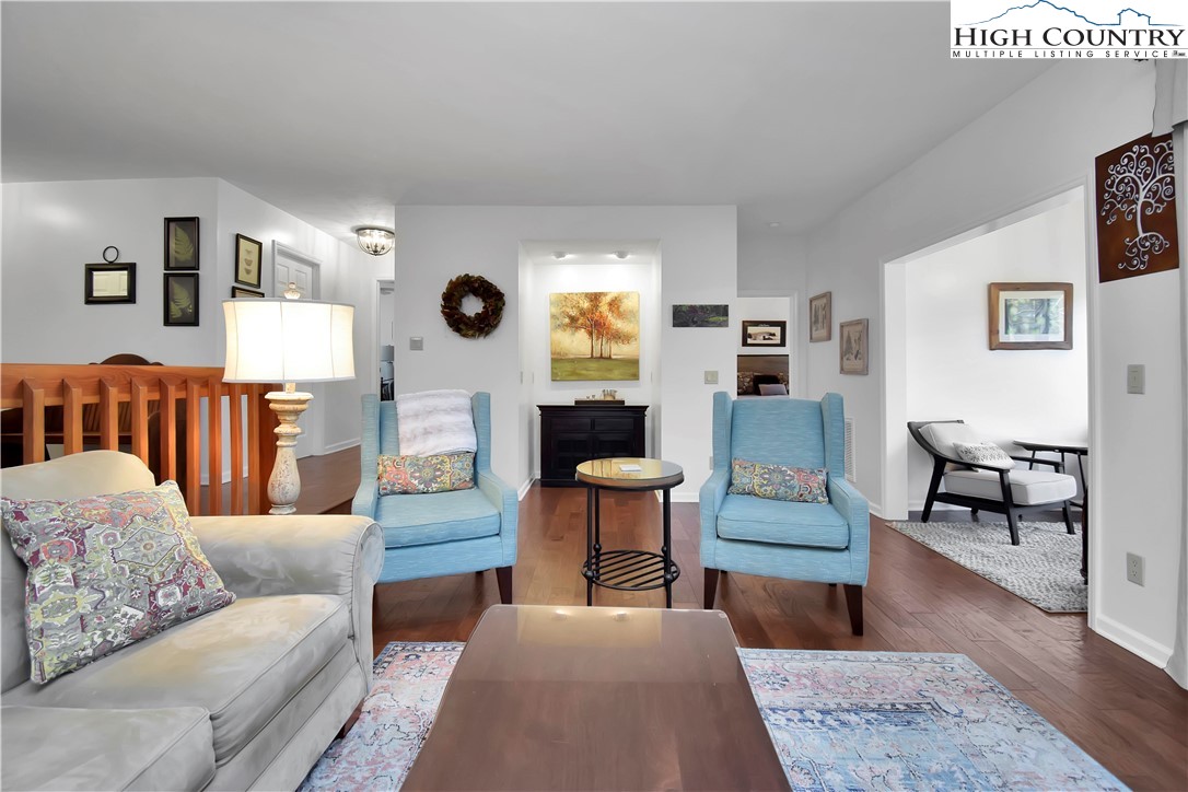 140 Manor View Lane, Unit CASCADES 2 Blowing Rock, NC 28605 - Photo 21 of 25 a living room with furniture and a rug