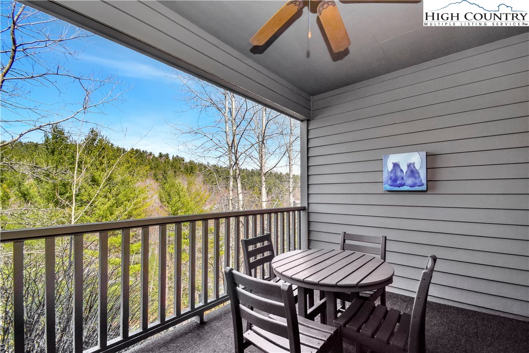140 Manor View Lane, Unit CASCADES 2 Blowing Rock, NC 28605 - Photo 22 of 25 a view of a chairs and table in the balcony