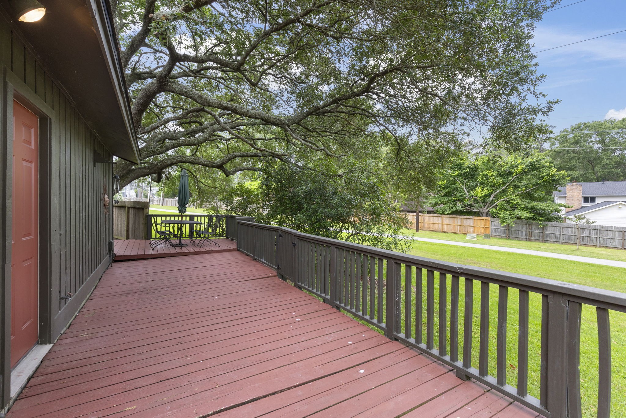 49 April Village Conroe, TX 77356 - Photo 17 of 46 a view of balcony with wooden floor