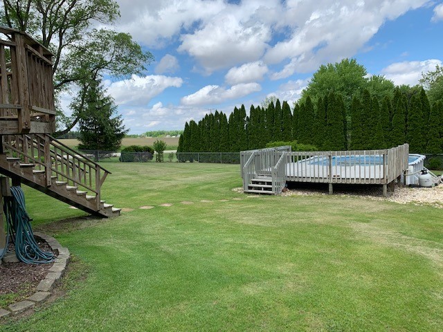 24780 Genesee Road Sterling, IL 61081 - Photo 14 of 15 a view of backyard with green space