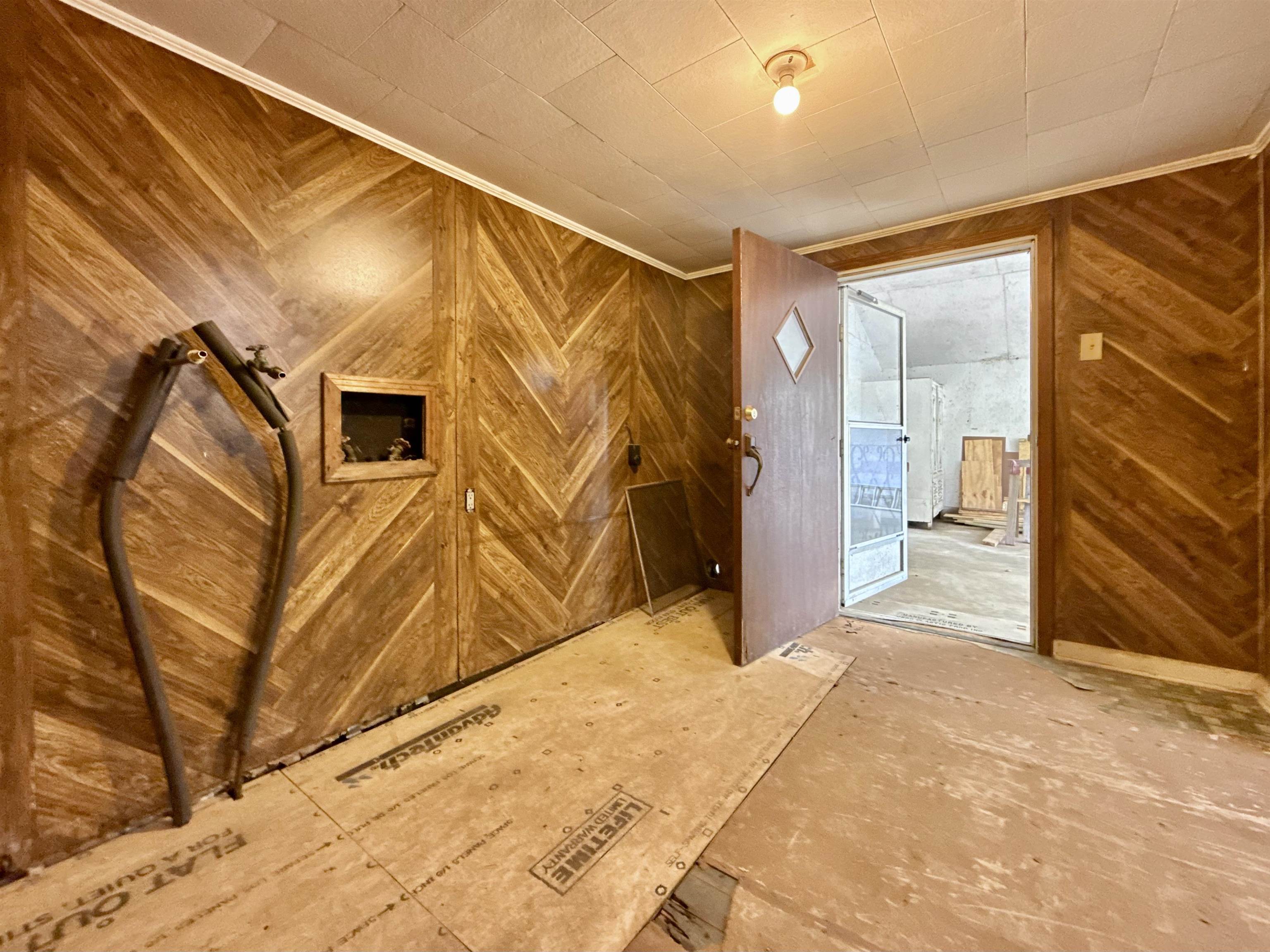 845 Needham Road Drummonds, TN 38023 - Photo 19 of 22 Bonus room with wood walls