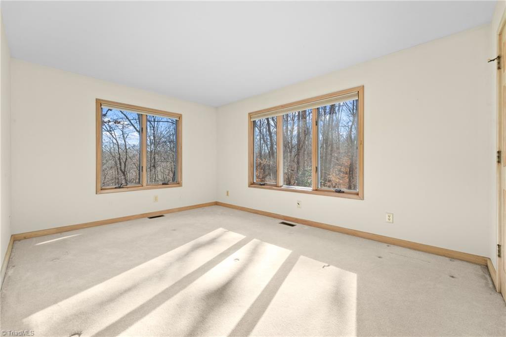 214 Hilton Road Stokesdale, NC 27357 - Photo 33 of 50 Second bedroom with all the great views.