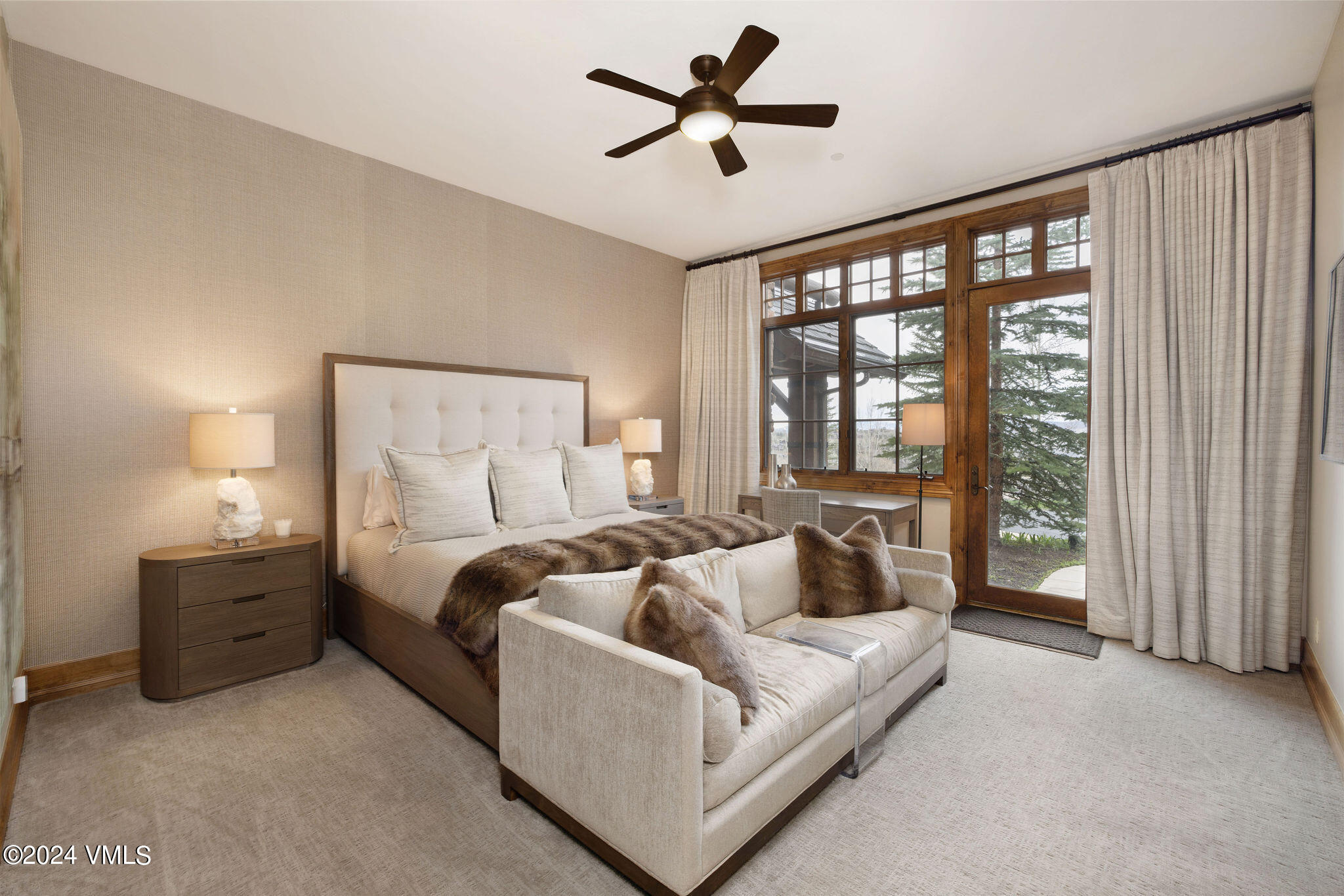 1101 Daybreak Ridge Road Avon, CO 81620 - Photo 25 of 30 a bed room with bed and a large window