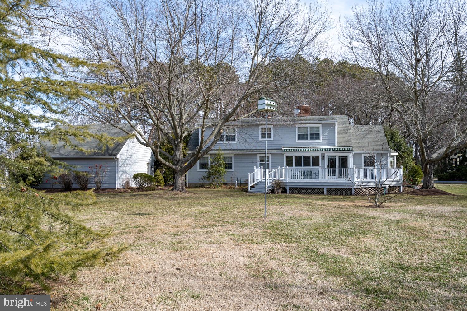 4260 Windrush Road Oxford, MD 21654 - Photo 14 of 39 a house that has a tree in front of it