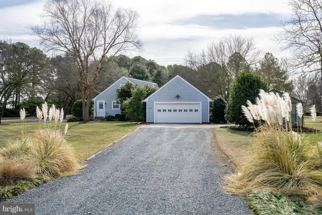 a house with trees in front of it